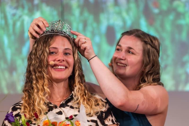 Germany's wine world is pretty traditional but change is afoot, though generally, structures for wine sovereigns are geared around women from the forms to fill out to the training classes involved and even the crowns. Last year's Baden Wine Queen, Julia Noll, will crown the Baden Wine Queen 2024/25, Lucia Winterhalter, in a ceremony organized by the Baden Winegrowers' Association. Philipp von Ditfurth/dpa
