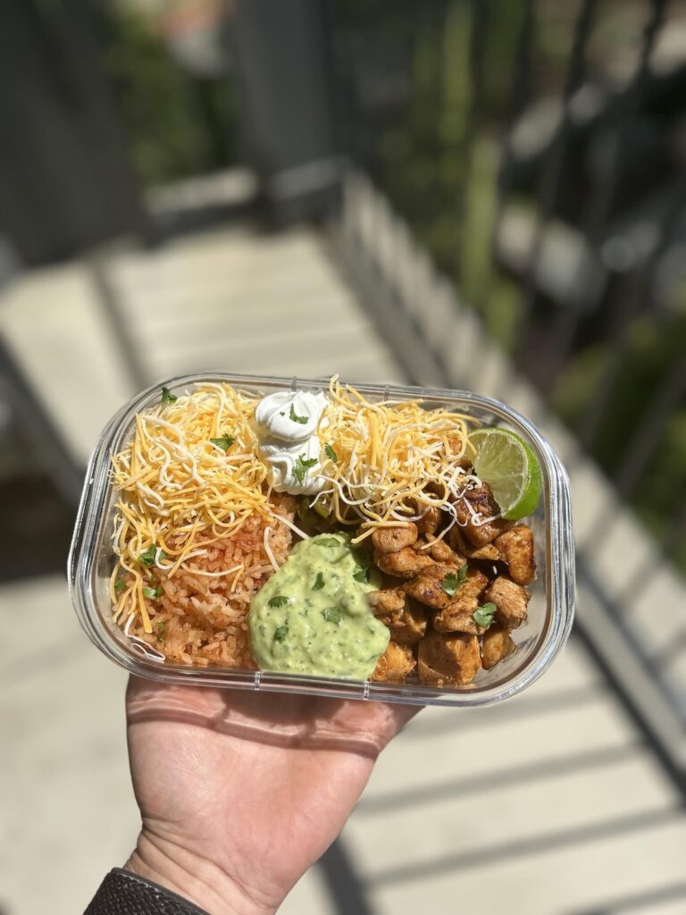 Mexican rice, onions and peppers, chicken/beef with jalapeño avocado sauce!