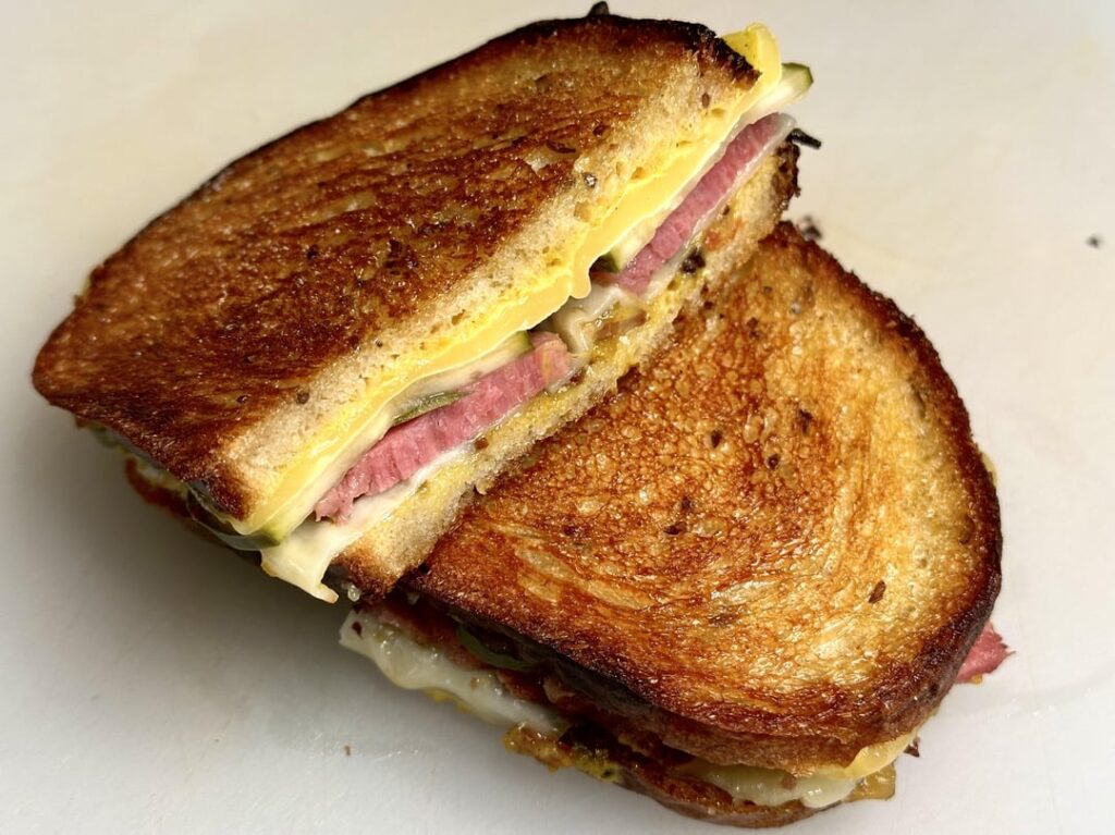 Corned beef melt on homemade rye