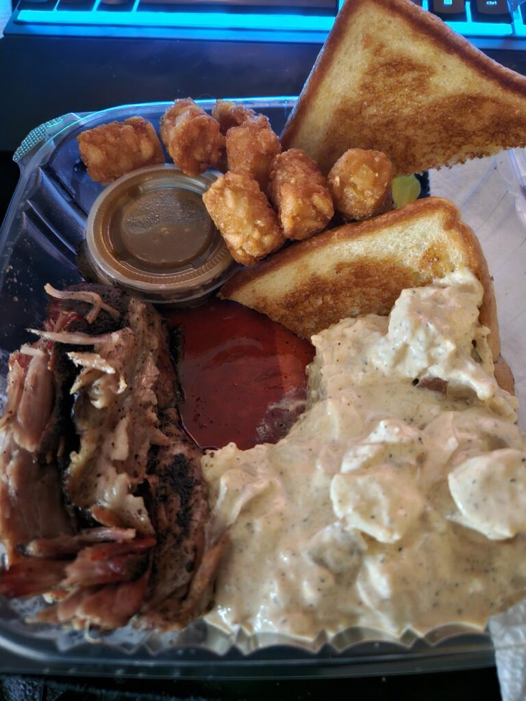 How many calories in this smoked pork, beans, tator tots, bread slices, and potato salad?