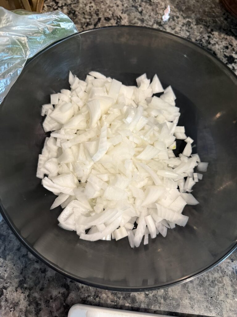 First ingredient for my dads famous pico: lots of roughly chopped onion