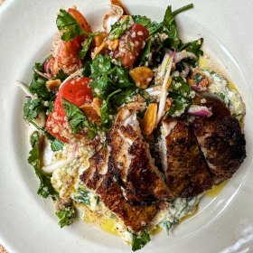 Grilled chicken with chickpeas, smoky eggplant and tomato is one of Julia Busuttil Nishimura’s Australian Open salads.