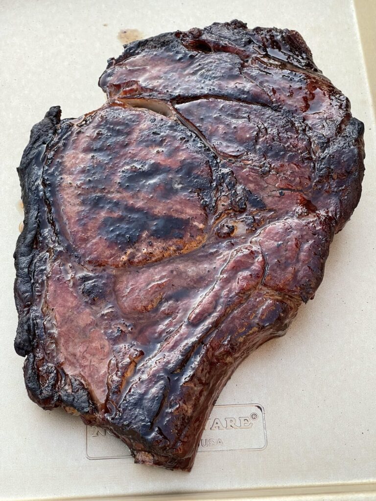 Yay or nay? Bone in n ribeye cooked over wood and charcoal