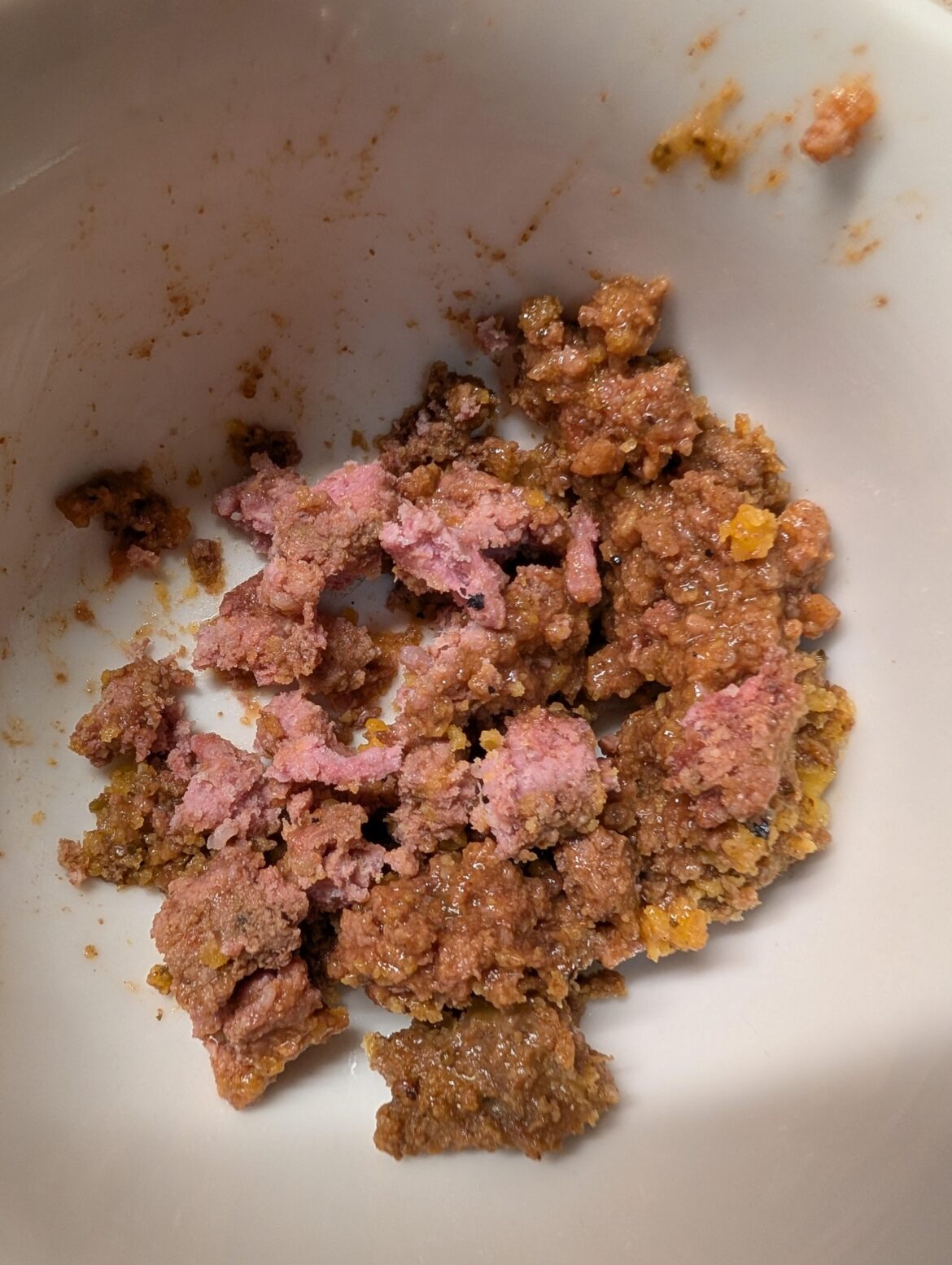 Pink in ground beef after 4 hours on high.