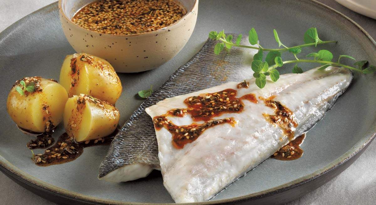 Avramar Lavraki with Sesame-Spiced Potatoes