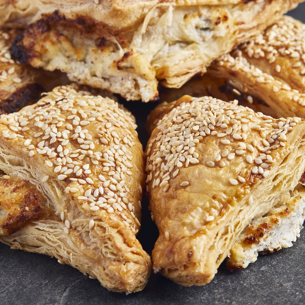 Pastries with sesame seeds on it.