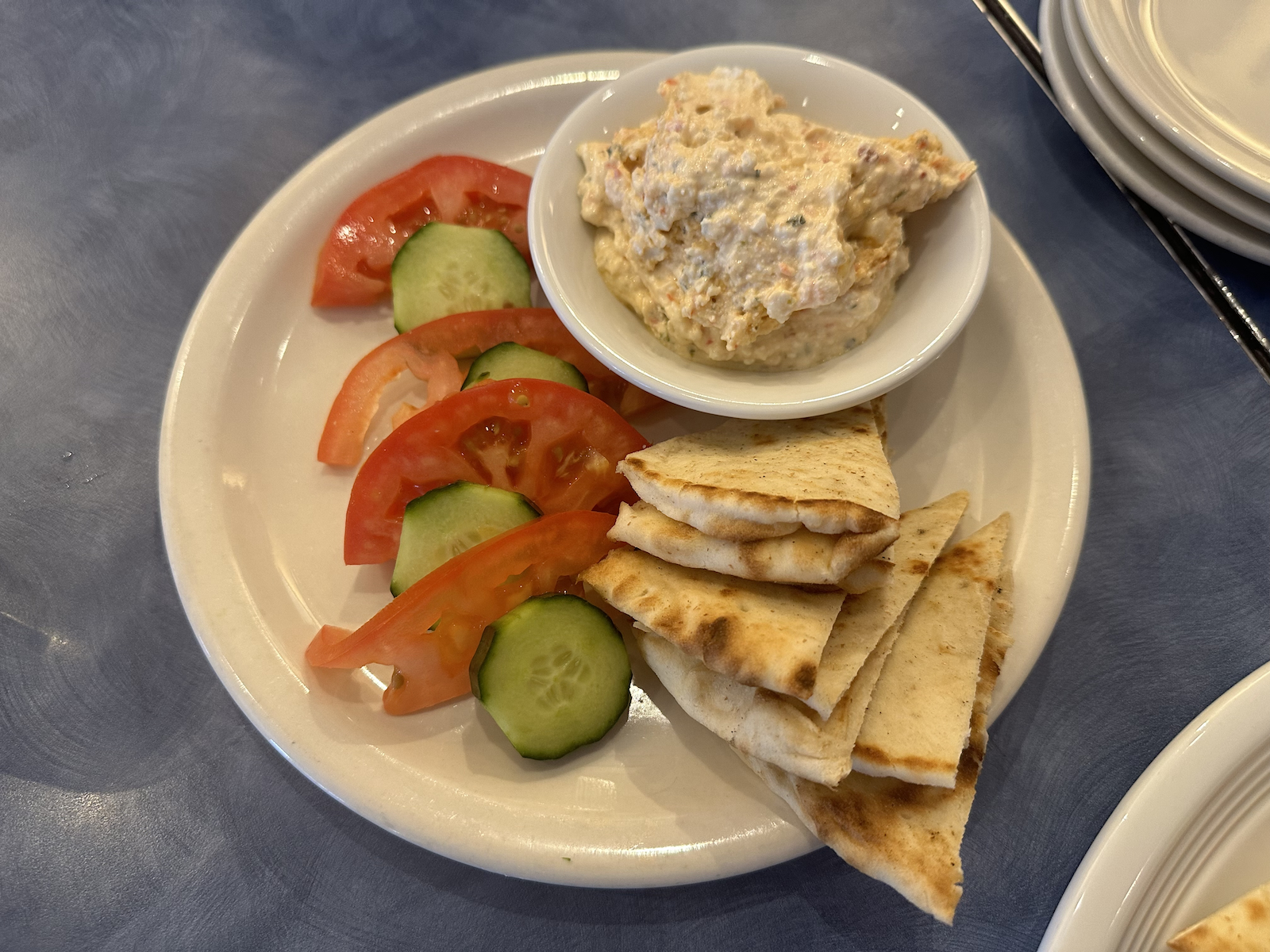 Pita and crudites with a dish of spicy feta at best Mediterranean restaurant Zorba's