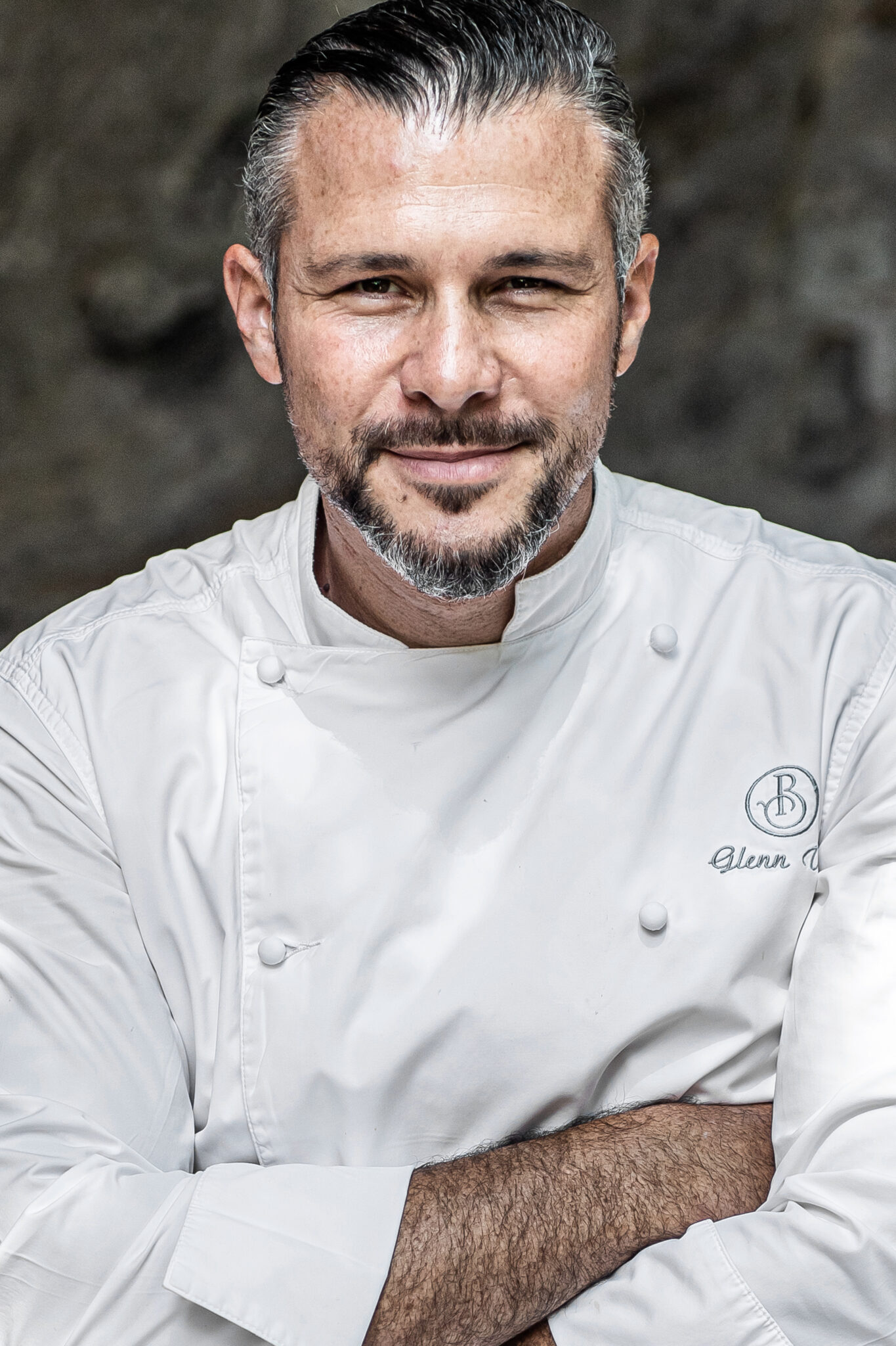 Glenn Viel is pictured smiling.