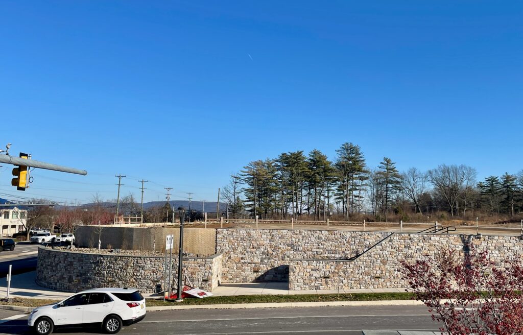 Patton Crossing wall viewed from Aldi