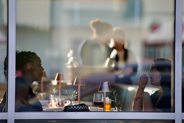 Customers dine at Olive & Rose on Friday, Oct. 4,...
