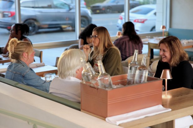 Customers dine at Olive & Rose on Friday, Oct. 4,...