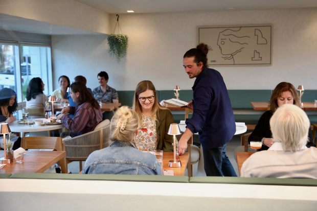Customers dine at Olive & Rose on Friday, Oct. 4,...