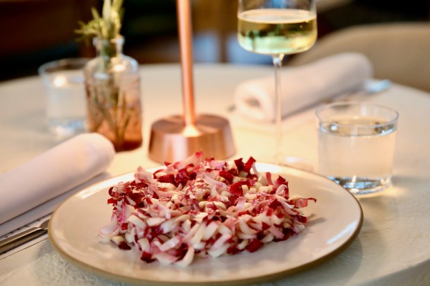 An endive salad is prepared on Friday evening, Oct. 4,...