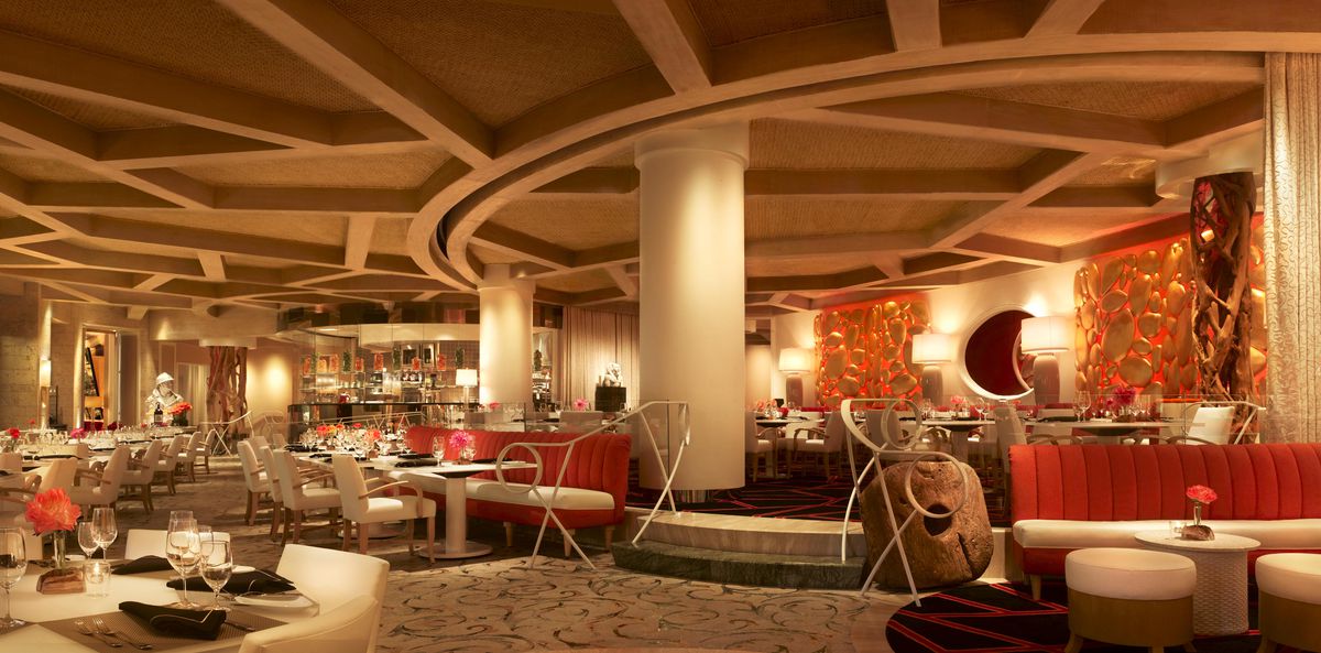 Lakeside interior with an orange-tinted dining room.