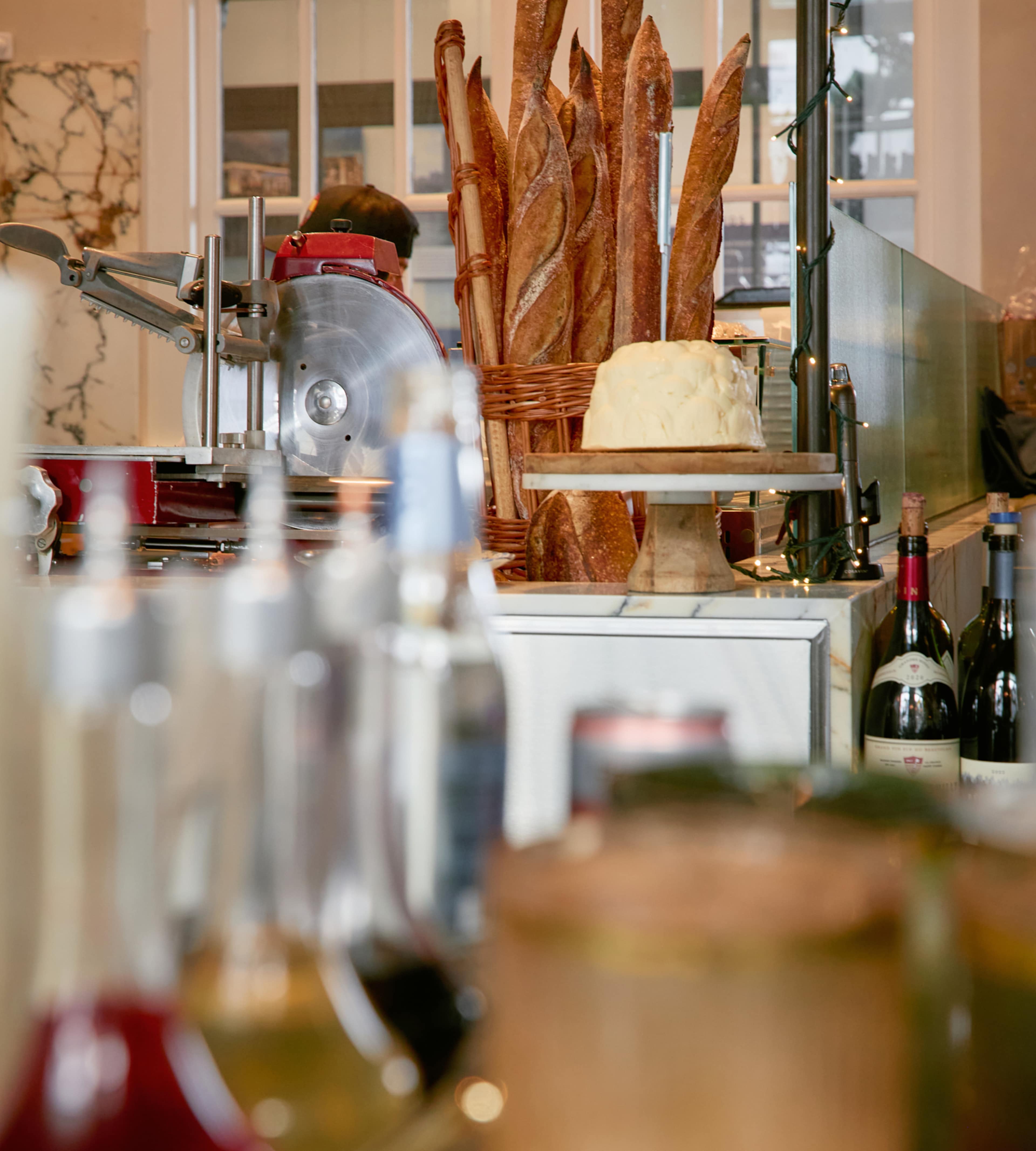 Baguettes and a mound of butter at Bon Délire