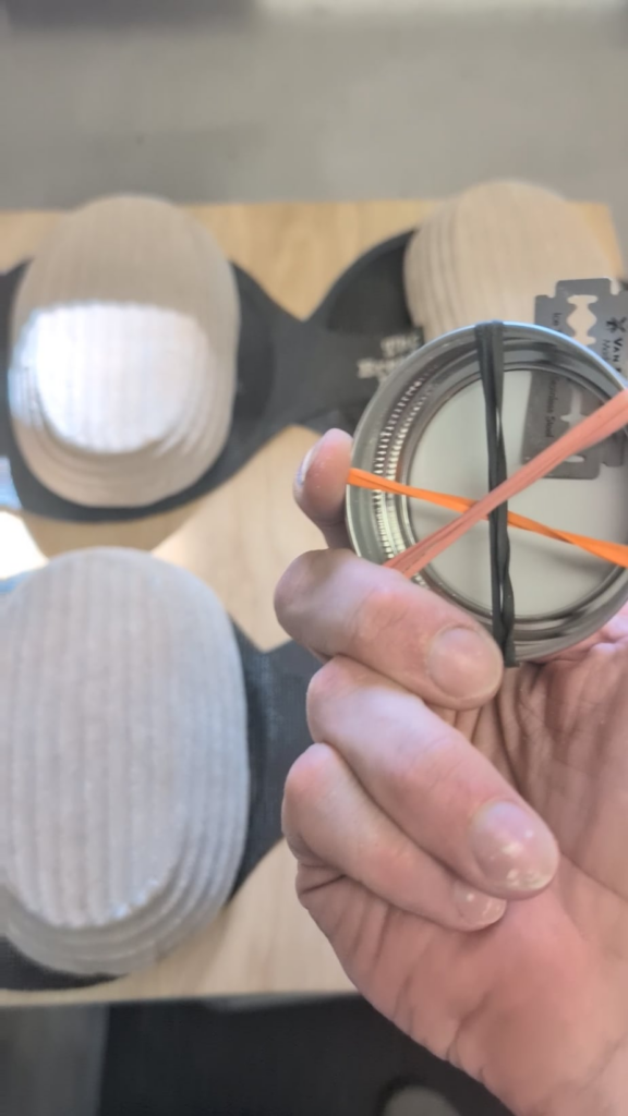 Almost through my 42-loaf bakeday and thought I'd share my ultra cheap blade holder