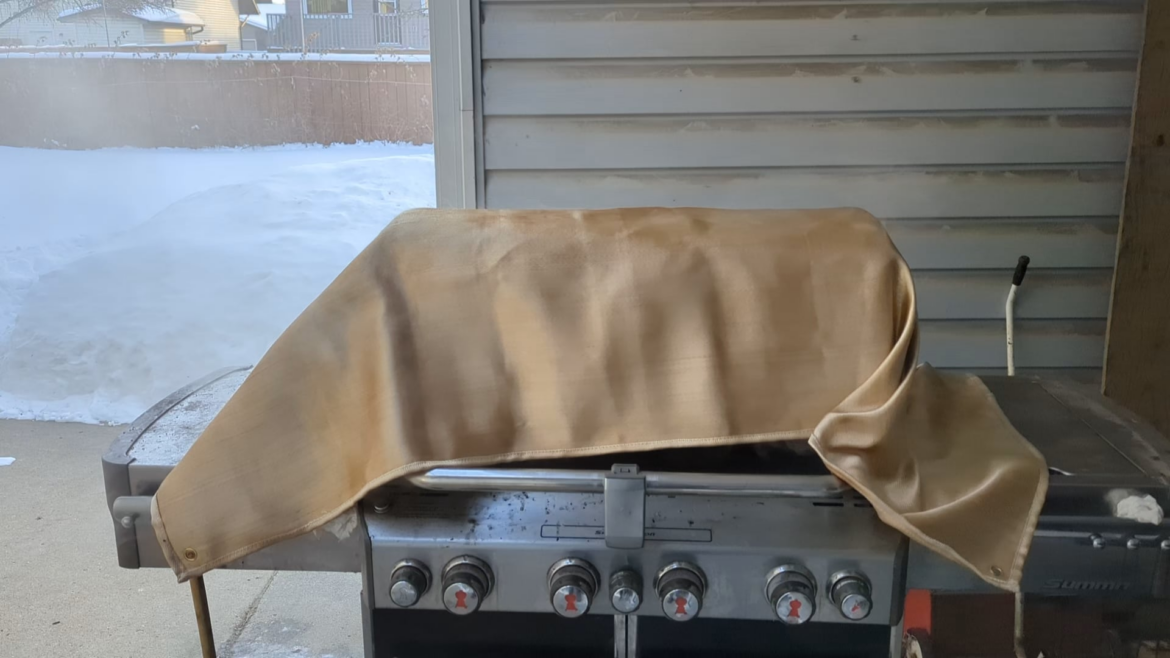 Morning 225 F smoking on the grill👍 (& using a fire blanket) w/ two racks of pork back ribs coming along