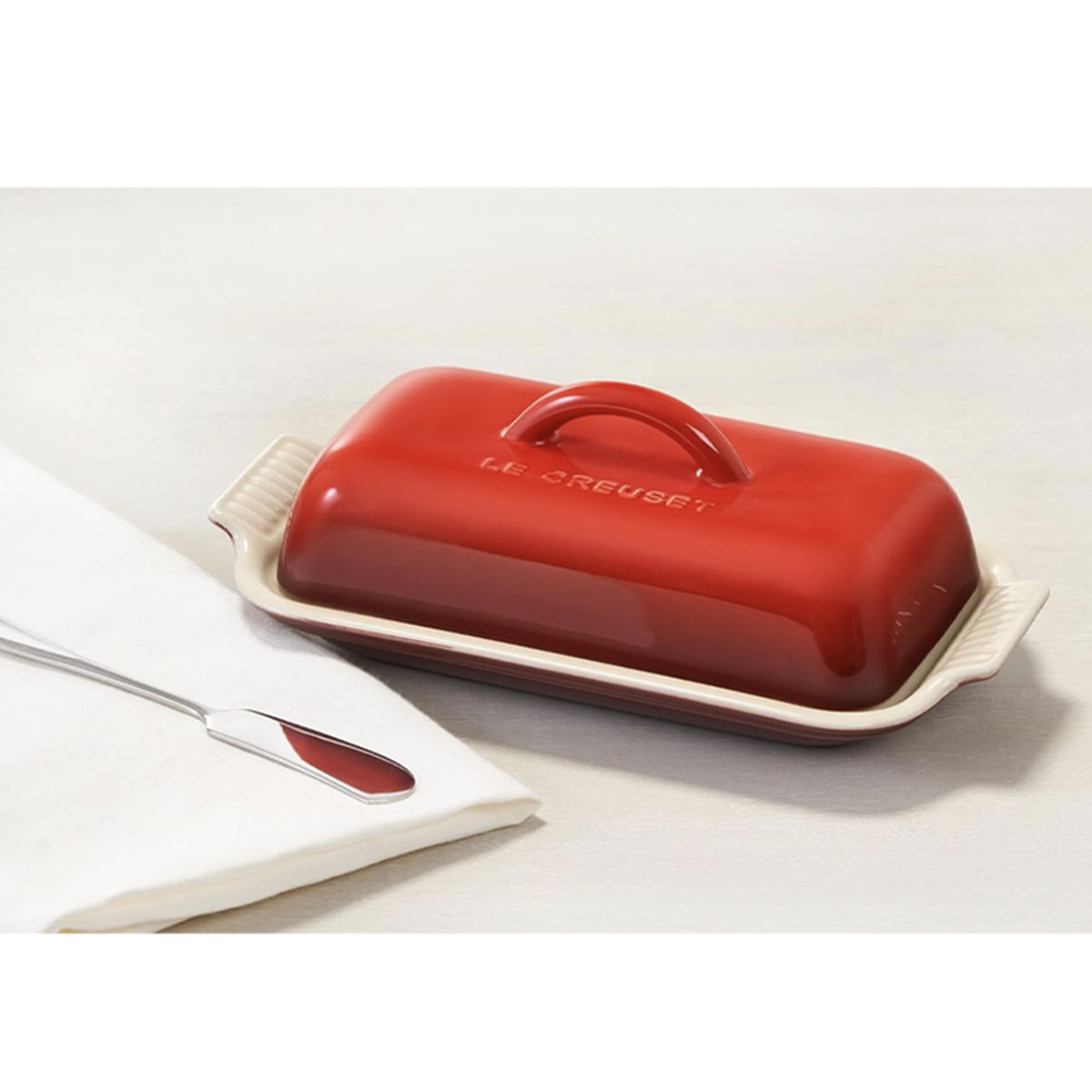 Red Le Creuset Stoneware Heritage Butter Dish.