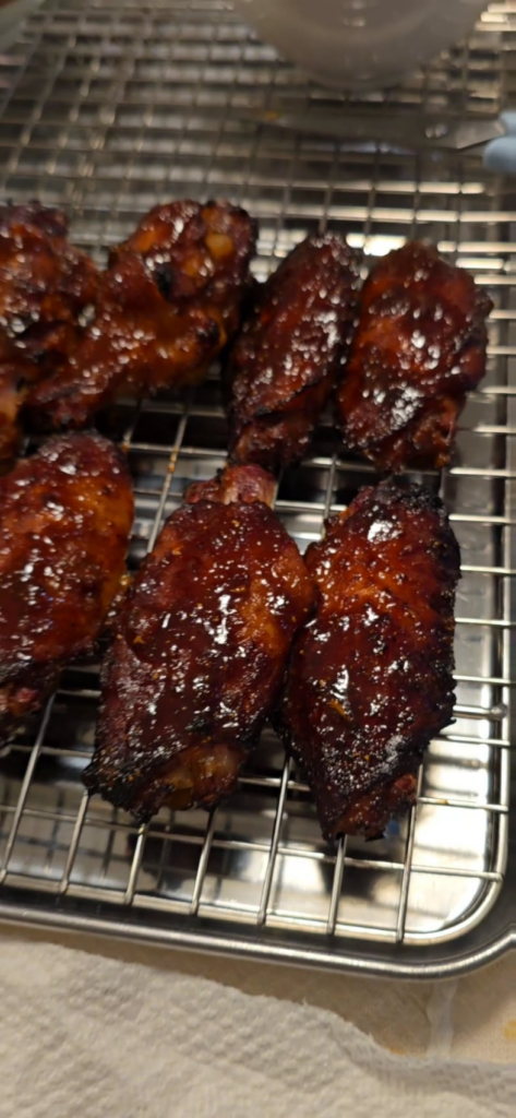 Grilled scallops and chicken wings on the kettle with vortex