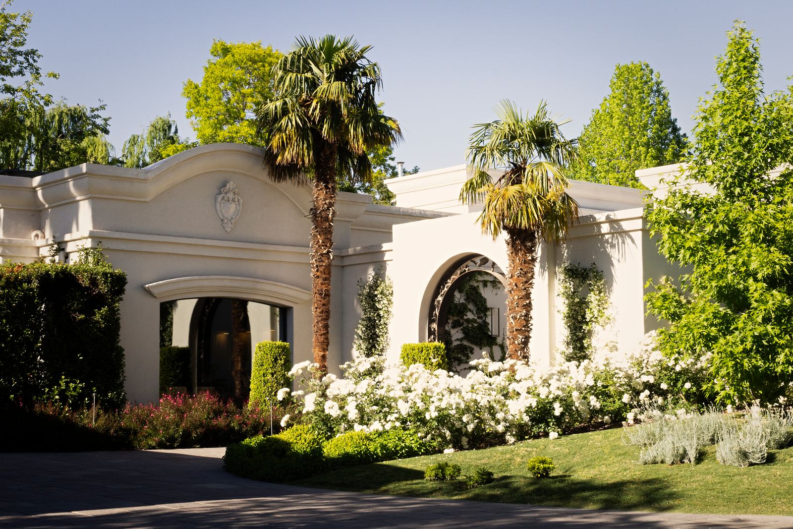 Image may contain Architecture Building House Housing Villa Grass Plant Tree Hacienda Vegetation and Outdoors