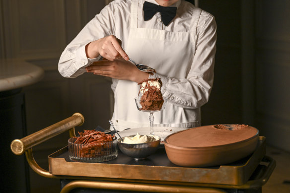 The chocolate mousse is served tableside.