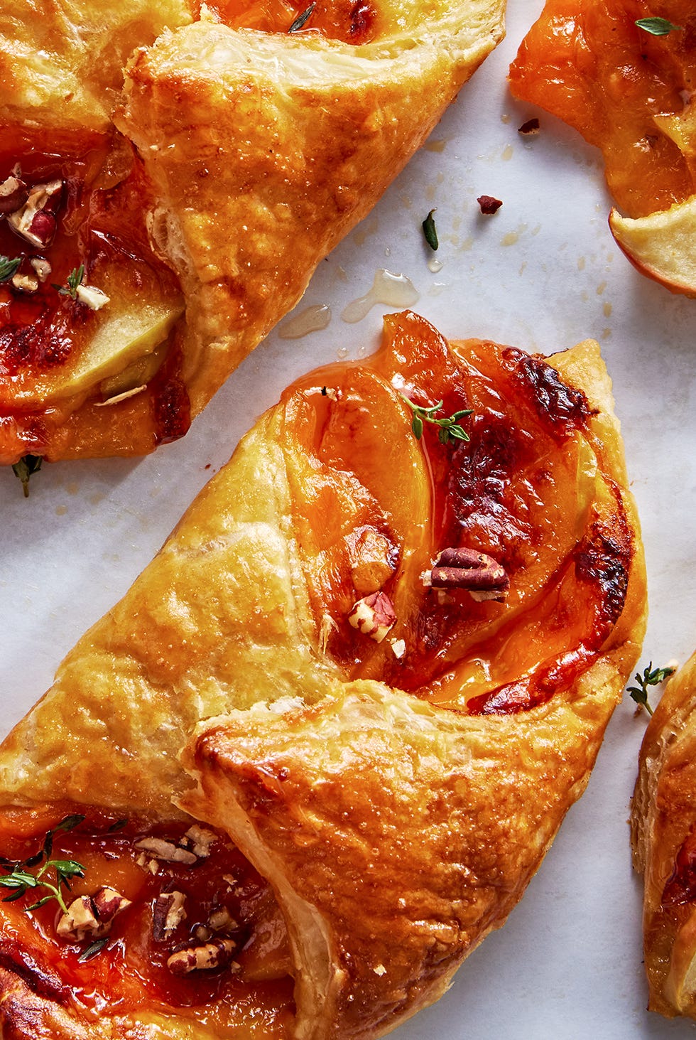 apple cheddar bundles with puff pastry honey pecans and thyme