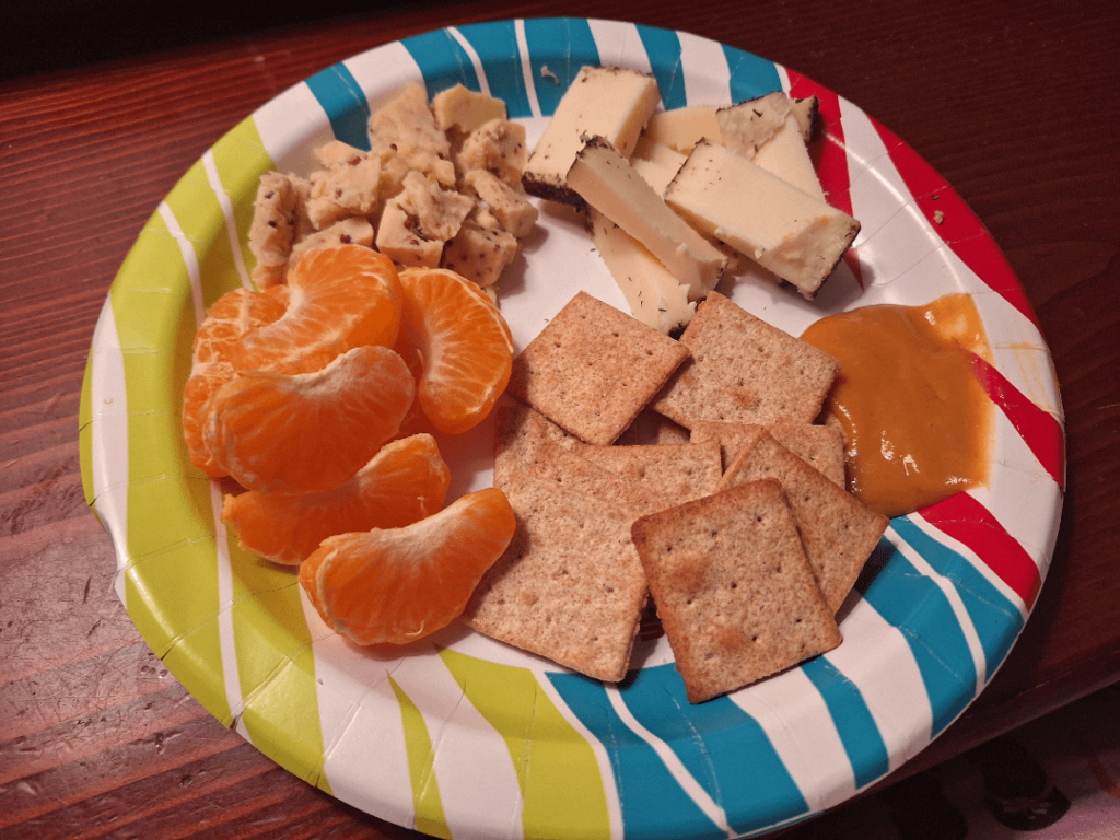 Somerdale Red Dragon, Dill Rubbed Fontina, Sweet Hot Garlic Mustard, Wheat Thins, and a mandarin orange for balance.