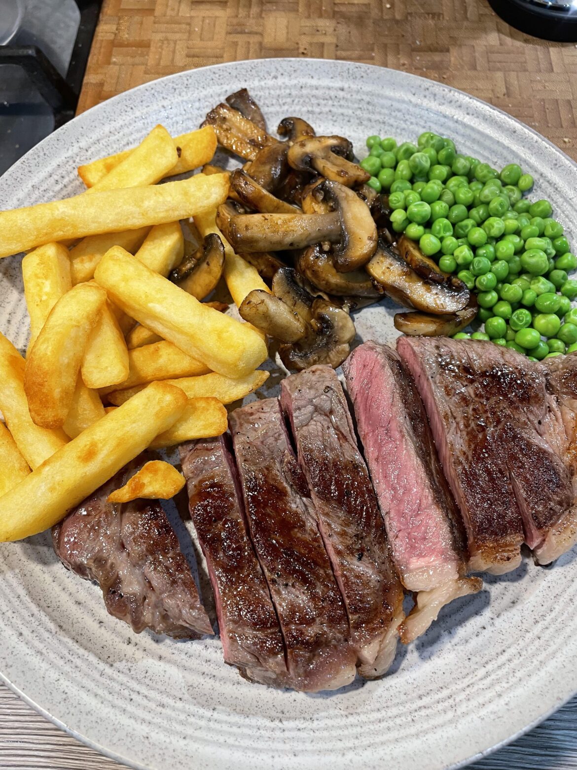 Friday evening, home alone, steak, chips and veg
