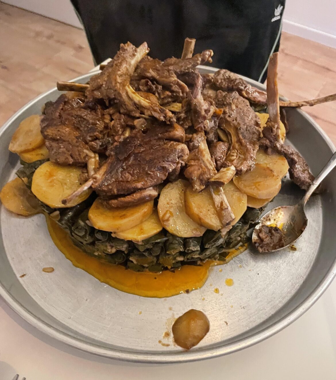 Lamb chops, potatoes, and stuffed grape leaves (warak enab)
