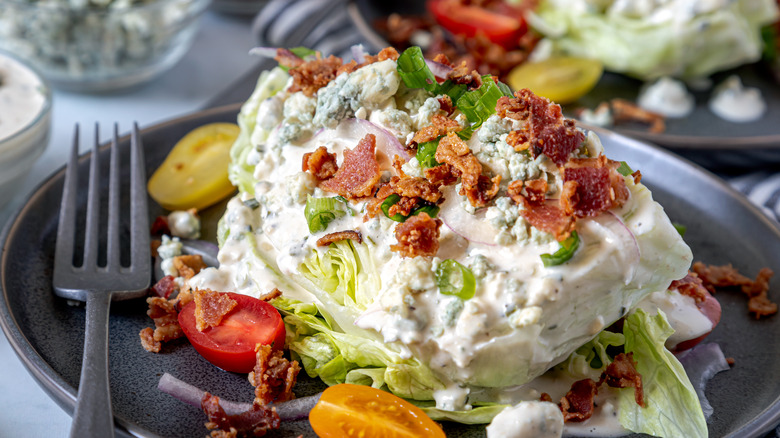 blue cheese dressing on wedge salad bacon bits