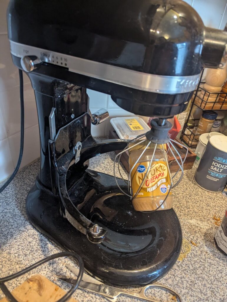 You can stir natural peanut butter before you even open the jar by carefully putting the jar into the whisk attachment of a stand mixer.
