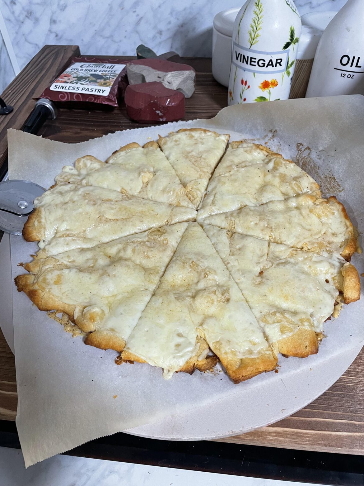 Croissant dough cheese pizza-like thing