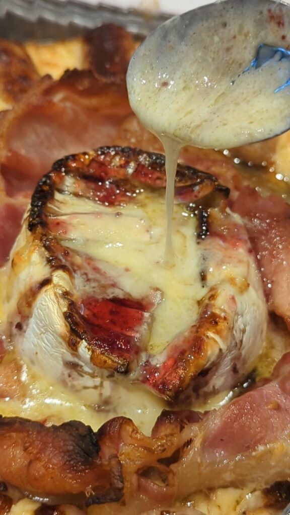 (Homemade) Pork Chipolatas, Smoked Back Bacon, With Vintage Cheddar Bake & German Cambozola With Cranberry Glaze