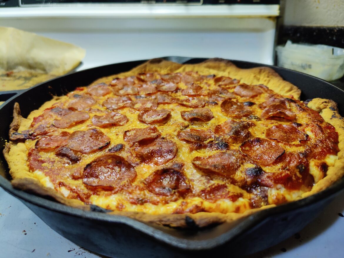 I made deep dish pizza from scratch in a cast iron.