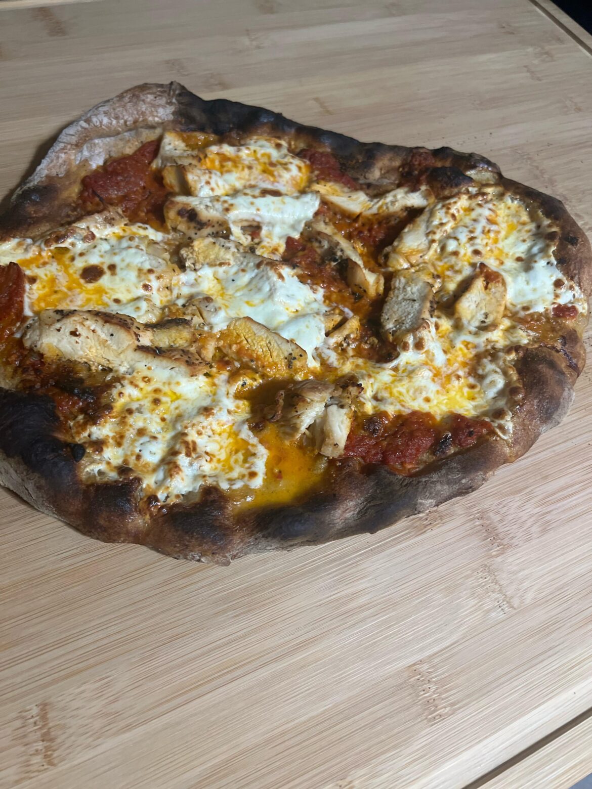 Guinness infused, 48 hour cold fermented chicken parm pizza