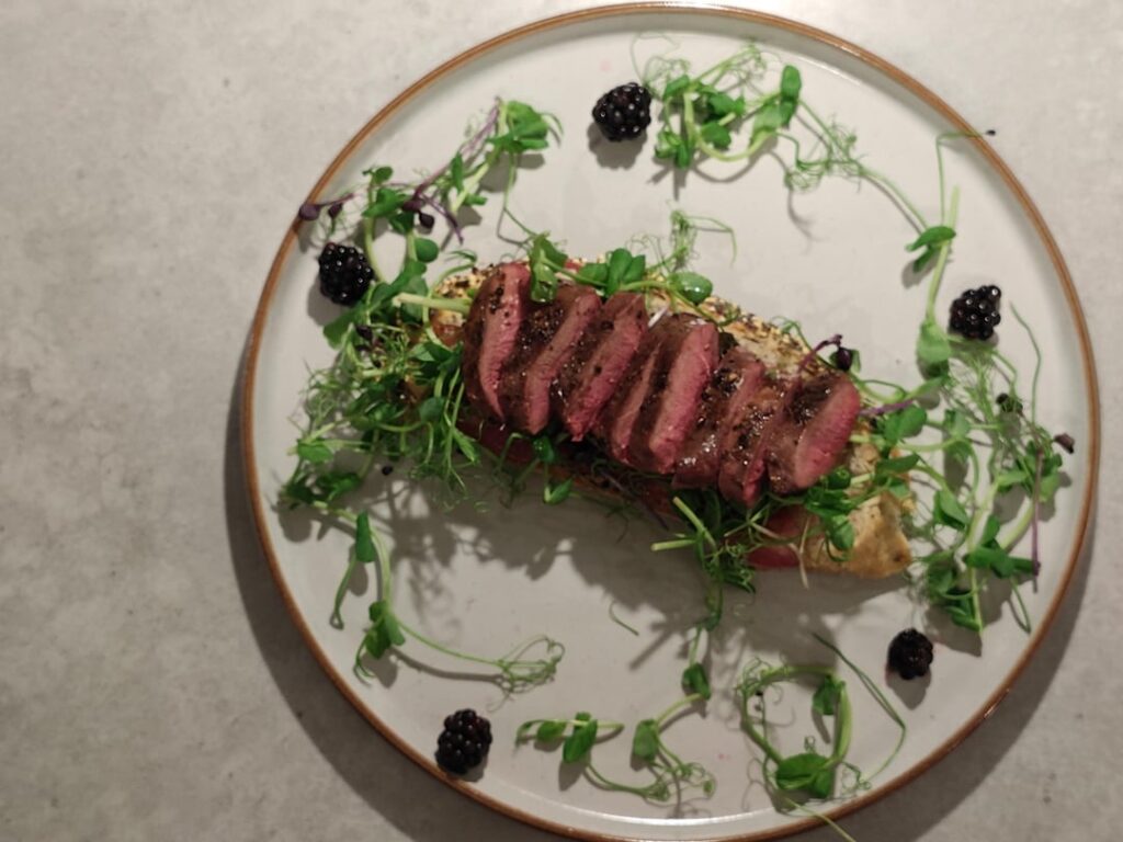 Trying to work on my plating... Pan Fried Wood Pigeon with smoked bacon on sourdough. Served with pea shoots & blackberries.