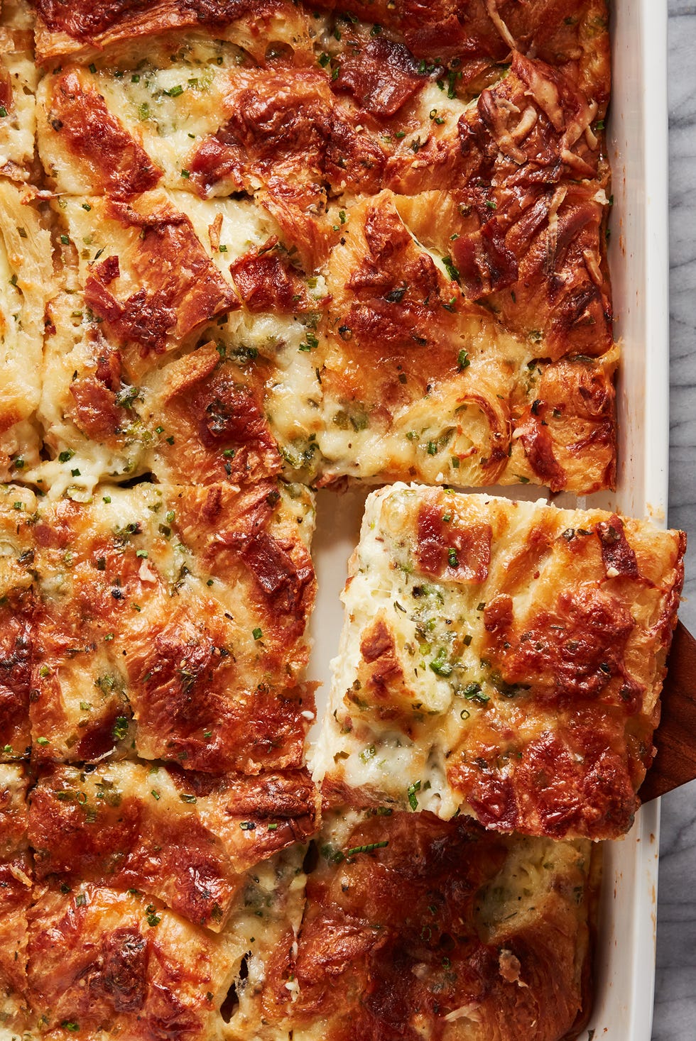 cheesy croissant casserole with bacon and chives
