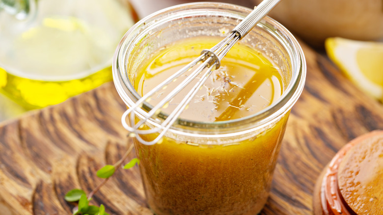 vinaigrette dressing with small whisk