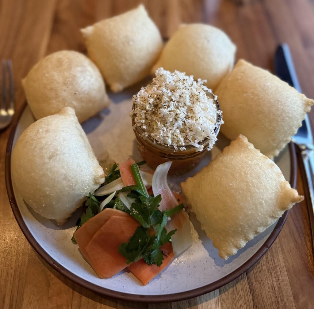 I ate at daisies and did not complain about the auto service charge or saw roaches