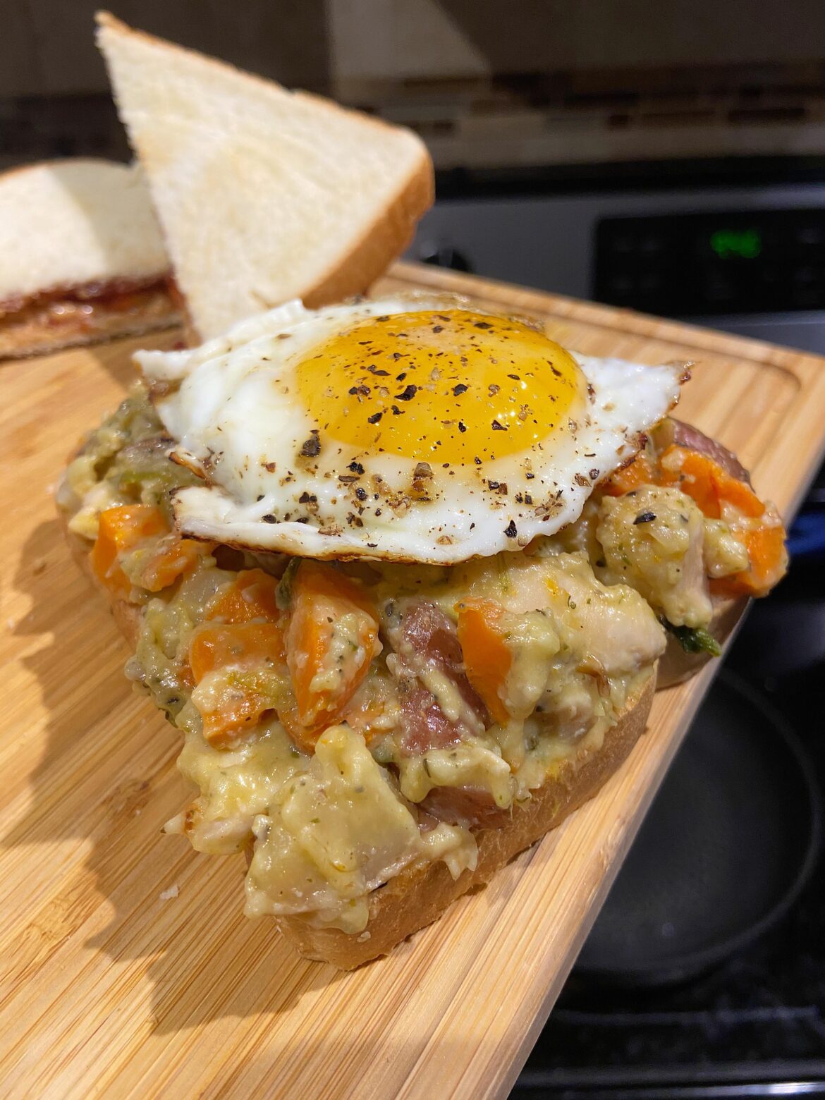 Leftover chicken pot pie filling with an egg on top 🥚