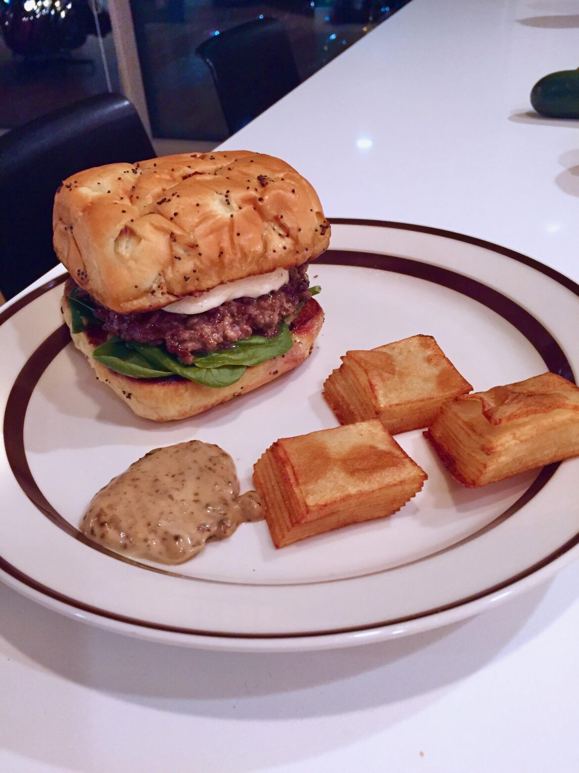 Late night thick burg and tater stacks - black garlic mayo and mozz.