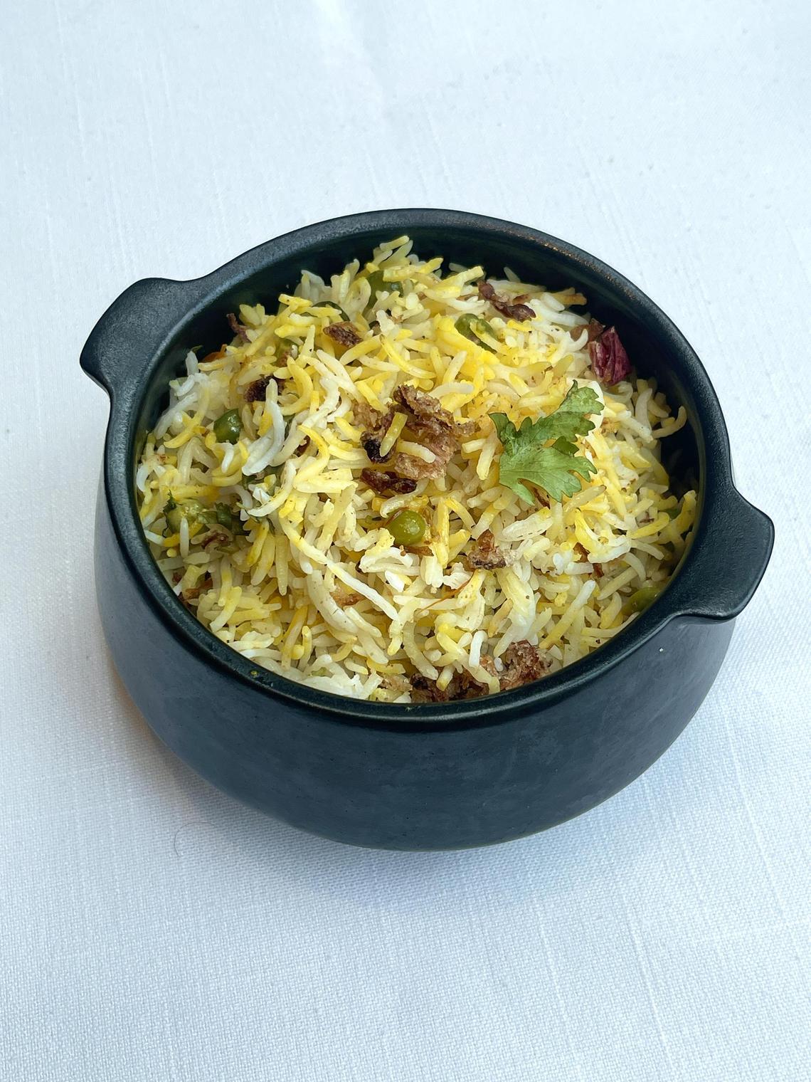 hkpicks09 - Barista Matar Pulao, a dish of basmati rice cooked with saffron, green peas and onion. 

Byline: Hedy Khoo
