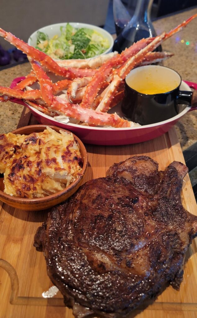 Homemade Bone-In Cowboy Ribeye With King Crab Legs