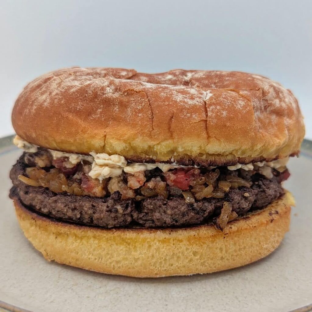 Condiment Obsessed: 4oz 80/20 grassfed ground beef, butter-toasted potato bun, dehydrated onions that I rehydrated in beef stock and brown mustard and then fried in beef tallow, heirloom tomato chutney seasoned with black pepper pork cracklins dust, and smoked sharp cheddar jalapeño cream cheese