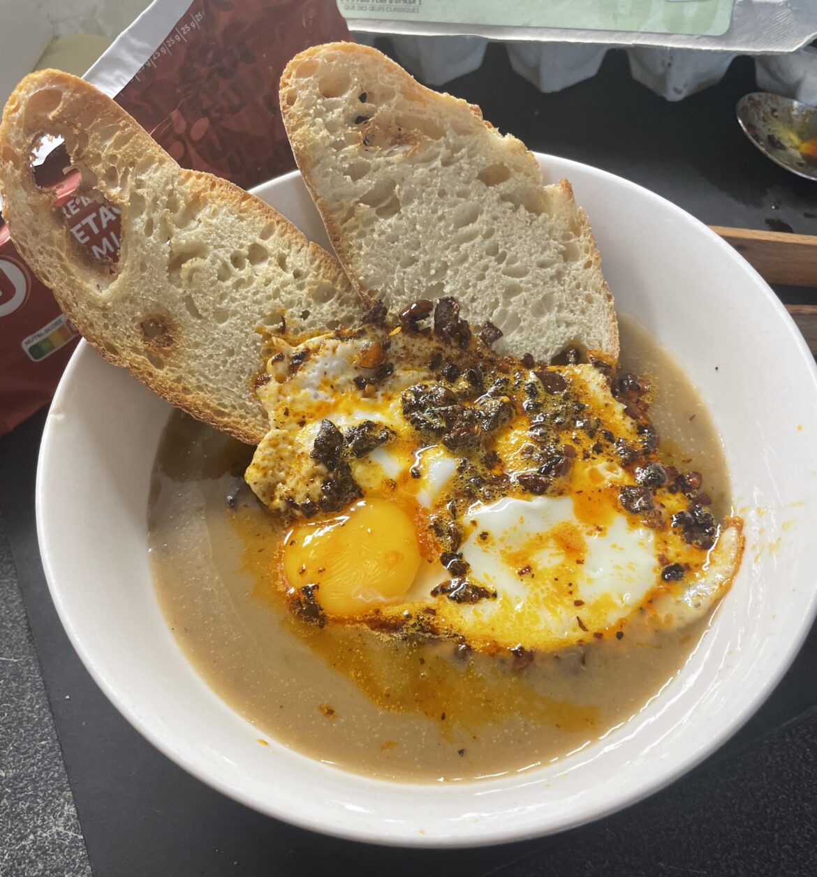 Chili crisp fried egg over creamy mushroom soup