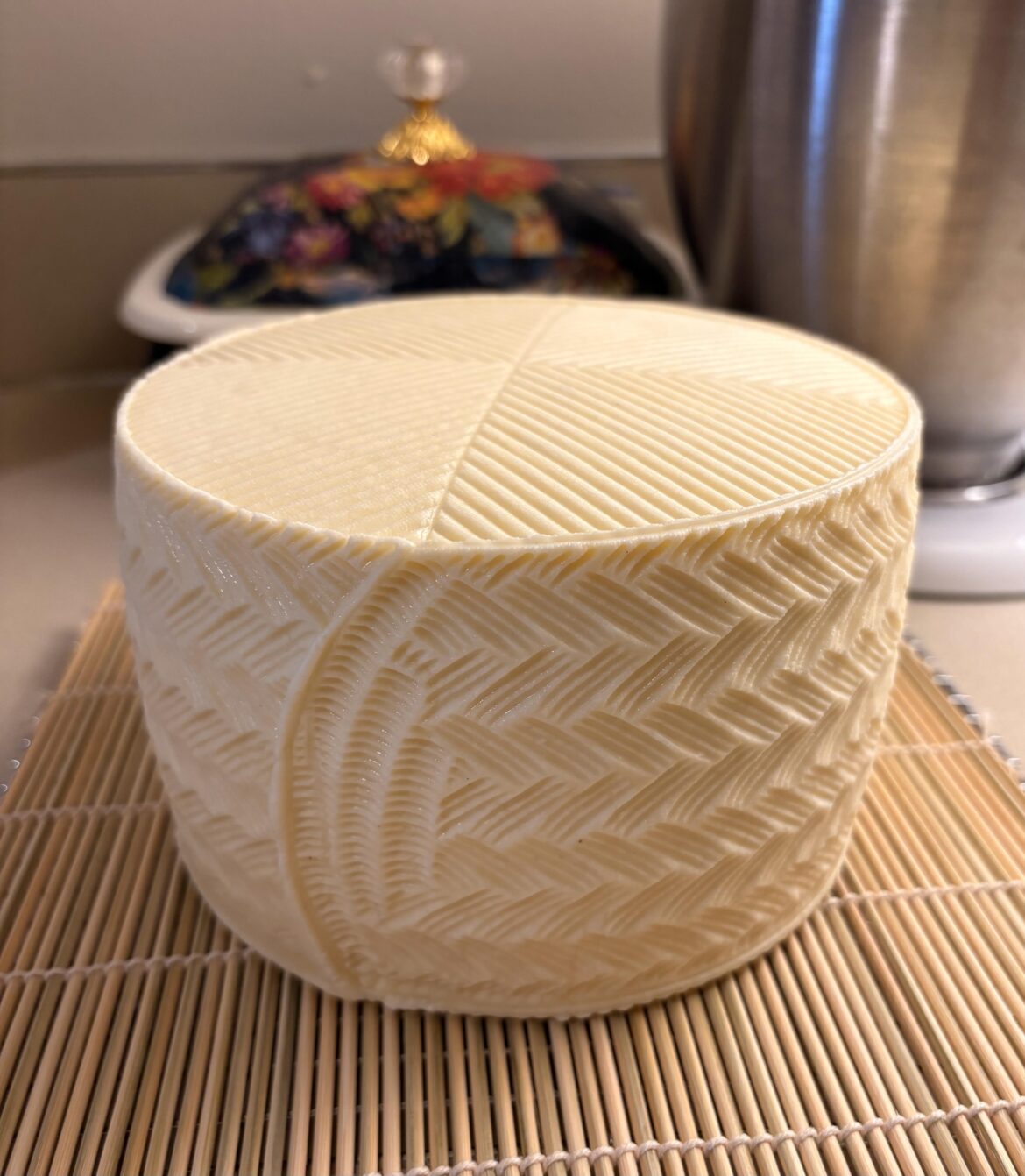 Fresh out of the press, homemade goat and cow milk Iberico cheese drying