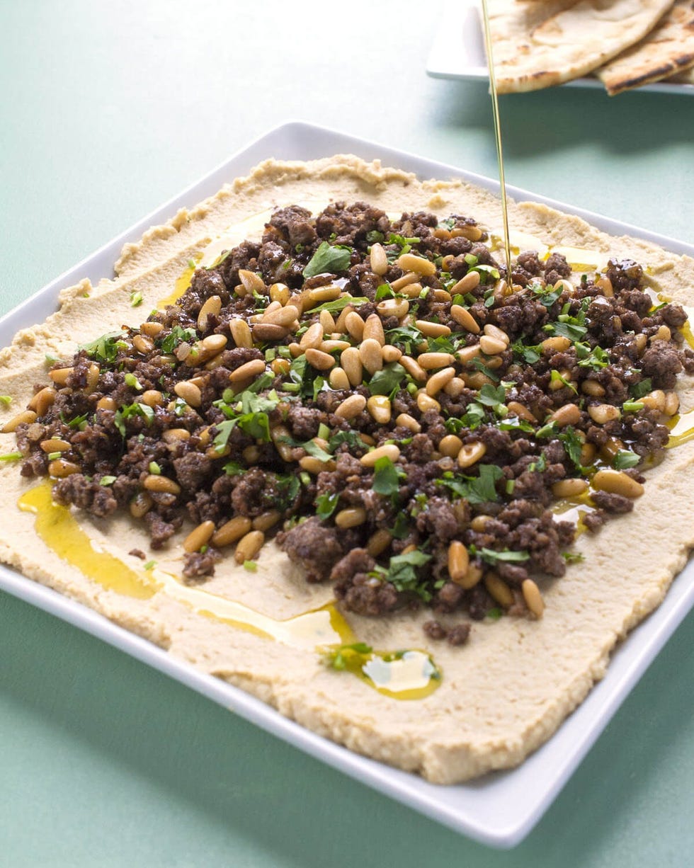 hummus with ground lamb and pine nuts