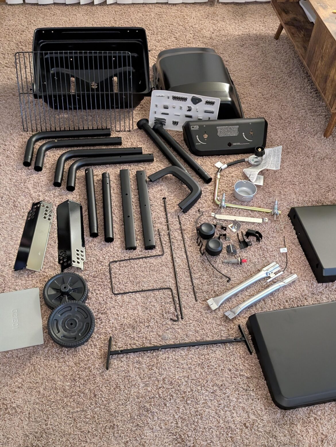 Tried finding a nice used Weber for a month with no luck. Bought a cheap charbroil. I don't think they could have made it into any more pieces.