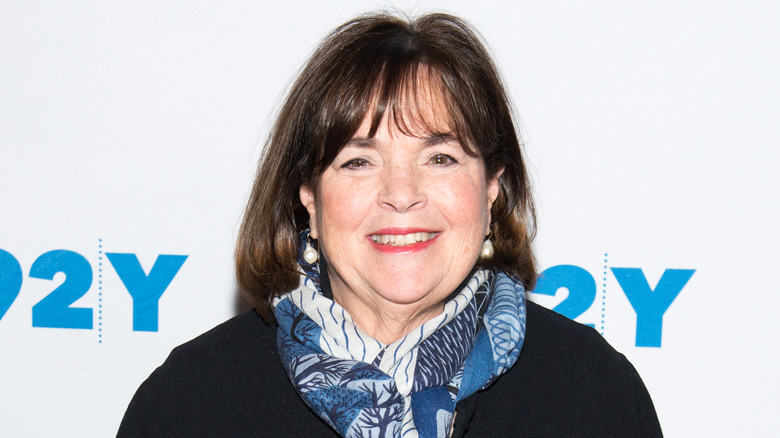 Ina Garten smiles on an event red carpet