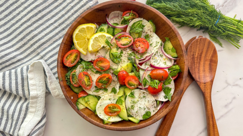 Wooden salad bowl of turnip salad